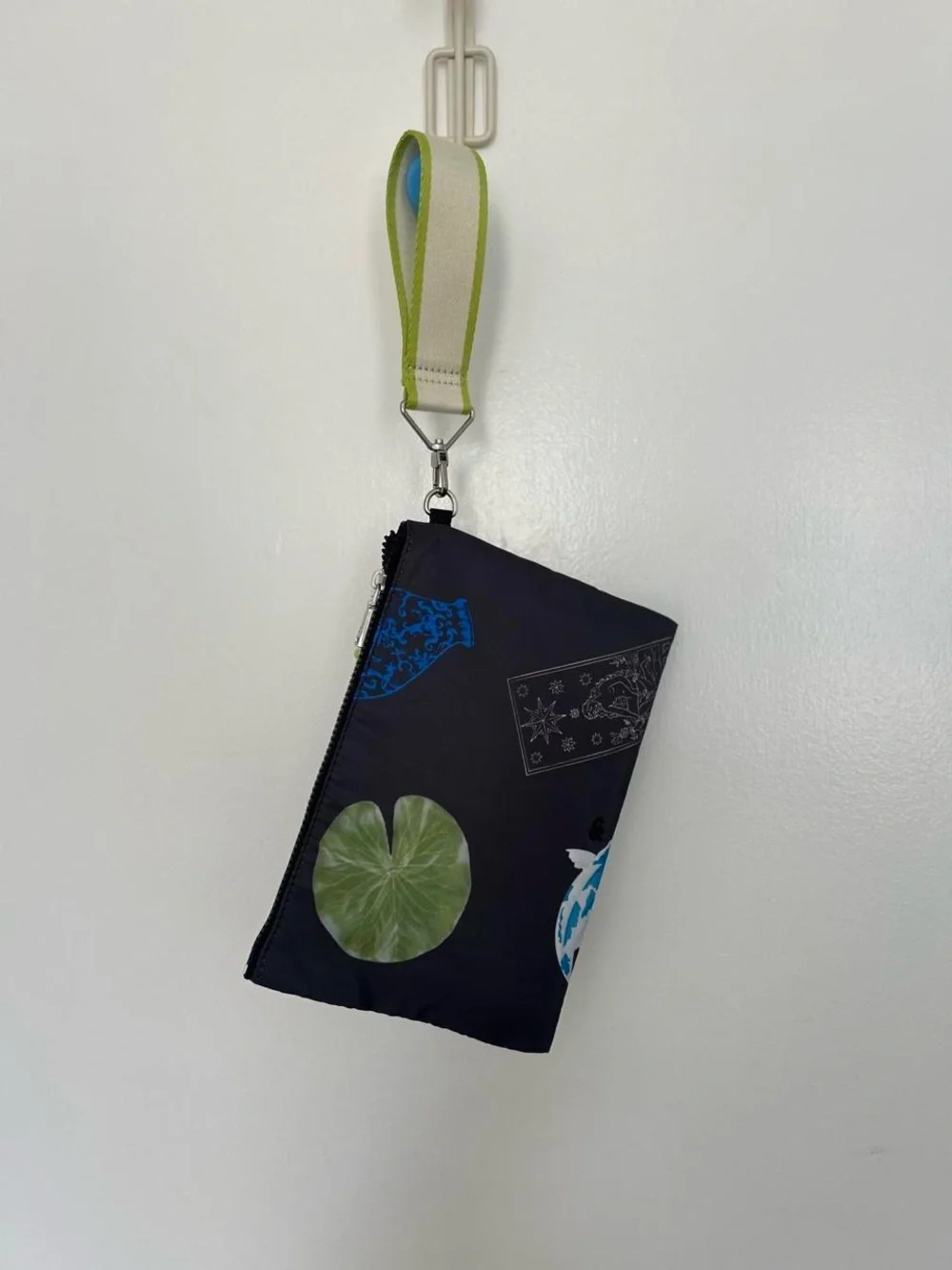 Printed Black Nylon Wristlet Pouch with Lime Accent from Parfois